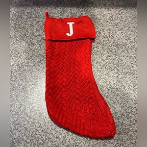 Large “J” Knit monogram Christmas stocking in red.